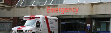 ambulance parked in front of emergency room